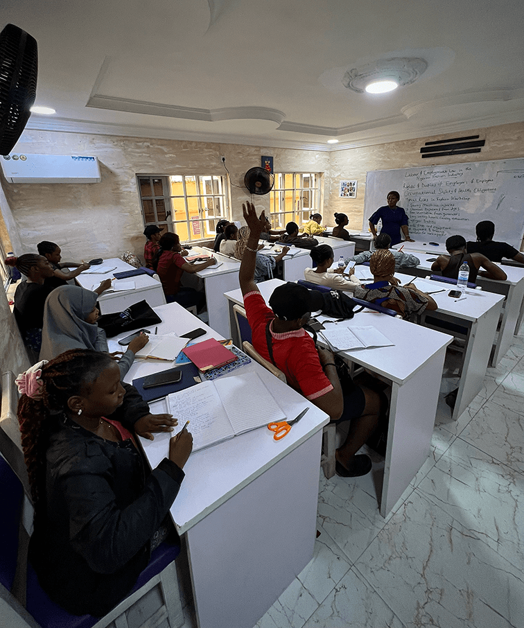 Fashion design students learning pattern drafting at TEFA Lagos