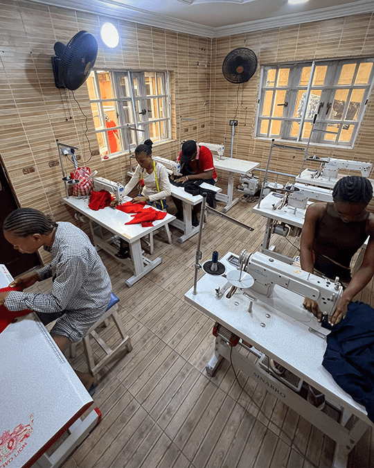 Fashion design students learning pattern drafting at TEFA Lagos